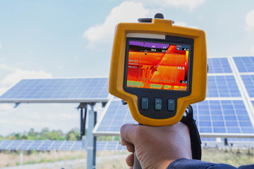 Thermoscan(thermal image camera), Industrial equipment used for checking the internal temperature of the machine for preventive maintenance, This is checking solar panel