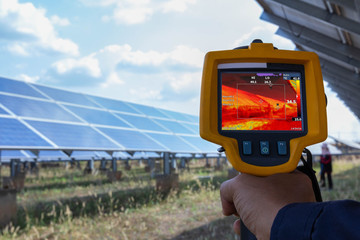 Thermoscan(thermal image camera), Industrial equipment used for checking the internal temperature of the machine for preventive maintenance, This is checking solar panel