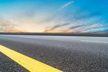 Fototapeta premium Sky Highway Asphalt Road and beautiful sky sunset scenery