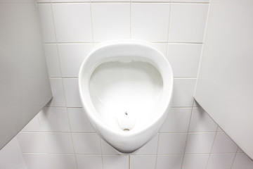 urinal on the wall