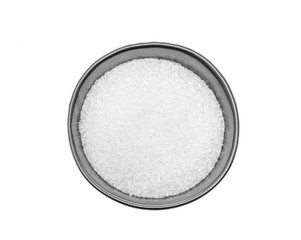 MonosodiumGlutamate (MSG or E621) in black bowl.