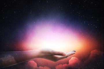 The light of the stars in the sky in the palm.