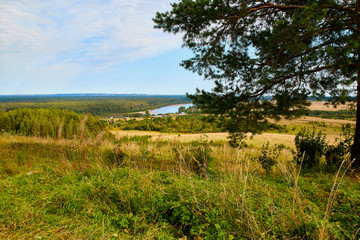 Beautiful view from the height of the landscape with fields and forests