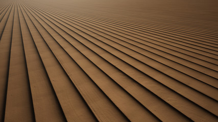 Fototapeta premium Wooden floor with bright light at the back