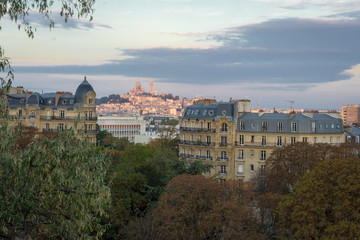 Fototapeta na wymiar Paris, France - 10 14 2018: Neighborhood of Villette. The park Buttes-Chaumont at sunrise. view from temple of Sybille
