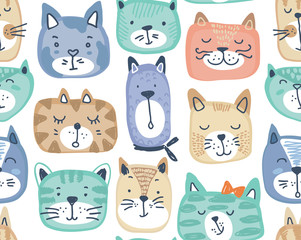 Obraz na płótnie Canvas Vector seamless pattern with hand drawn colorful cat faces.