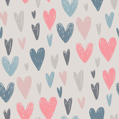 Vector seamless pattern with hand drawn hearts in sketch style.