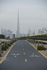 Dubai skyline from Nad Al Sheba bicycle track road, Dubai, United Arab Emirates