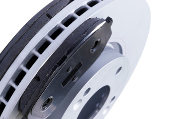 Brake discs and brake pads isolated on white background. Auto parts. Brake disc rotor isolated on...