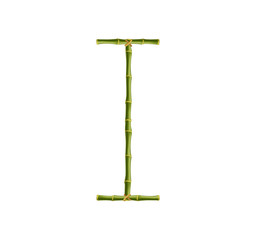 Capital letter I made of green bamboo poles on white background.