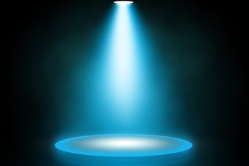 Blue light on stage studio background.