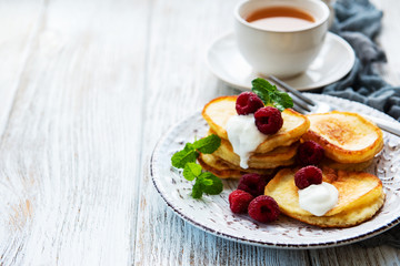 Delicious pancakes with raspberries