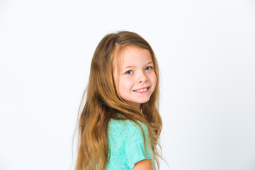 portrait of young, pretty girl with blond hair in the studio