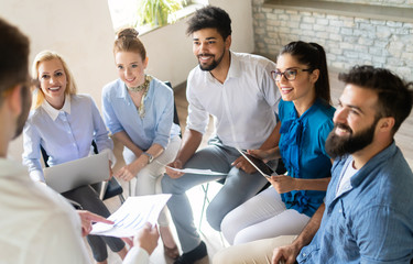 Happy creative team in office. Business, startup, design, people and teamwork concept