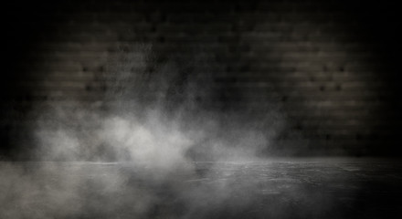 Background of an empty dark-black room. Empty brick walls, lights, smoke, glow, rays 