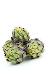 Obraz premium globe artichokes isolated on white copy space