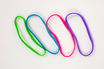 colorful rubbers on a white background