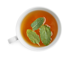 Cup of hot tea with mint on white background