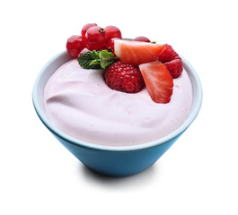 Bowl with tasty yogurt and berries on white background