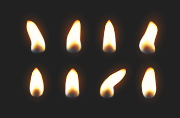 Candle flame lights isolated on black background. Set of burning fire. Vector realistic candlelight elements design.