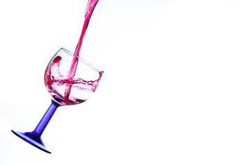 wine pouring in a glass splash