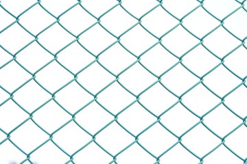 Close up green metal fence on white isolated background for backdrop pattern 