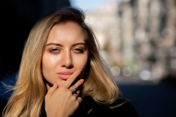 Closeup shot of sexy model with natural makeup posing with soft sun light and shadow. Copy space