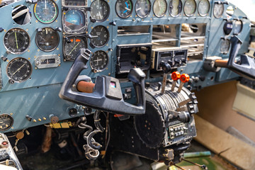 Wrecked and abandoned aircraft cockpit 