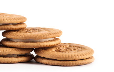 Dry thin crackers in a wrapping paper and on a sackcloth