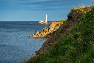 North Sea coast with St. Mary's Lighthouse, seen from Hartley in Tyne And Wear, England, UK