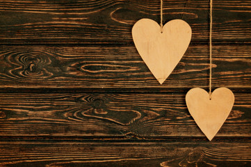 Wood heart on wood background