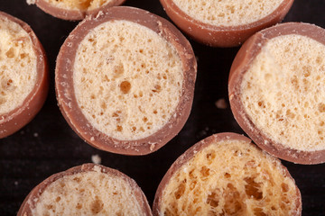 Chocolate honeycomb sweet cut in half