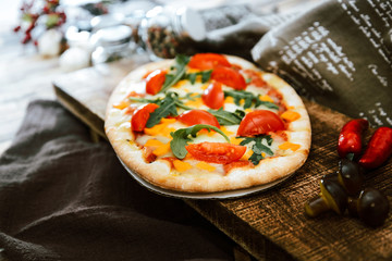 pizza with mozzarella, emmental and cheddar cheese