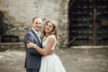 Wedding couple. Pretty bride and stylish groom.