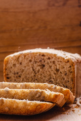 Sliced whole wheat bread on cutting board