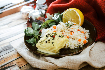 Andalusian fish, saffron rice with vegetables