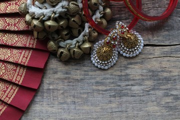Indian decorations for dancing: bracelets, bells for the legs - ganguru, earrings and elements of the Indian classical costume for dancing bharatanatyam.