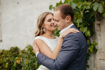 Fototapeta premium Wedding couple. Pretty bride and stylish groom.