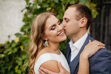 Fototapeta premium Wedding couple. Pretty bride and stylish groom.