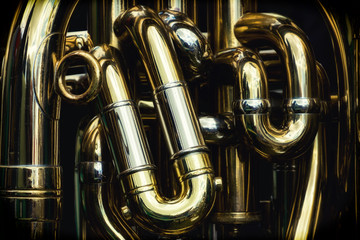 Detail of the brass pipes of a tuba