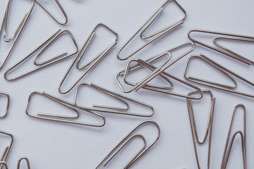 Fototapeta premium Paperclip on the white background.