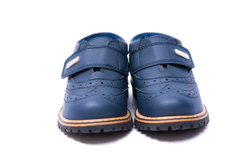 Blue baby shoes isolated on white background