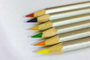 Naklejka premium Colored pencils, ground