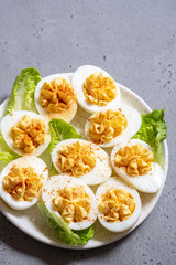 Healthy Deviled Eggs as an Appetizer with Paprika