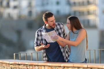 Couple arguing about travel destination on vacation