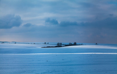 Fototapeta na wymiar Snow-covered fields