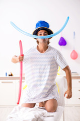 Young man celebrating his birthday in hospital