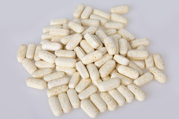 Scattered vitamins and supplements for Healthy Nutrition and eating isolated on white background