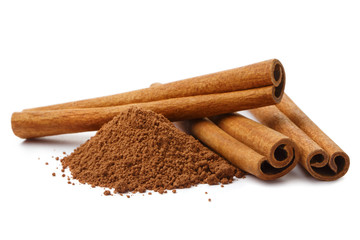 Cinnamon sticks and powder, isolated on white background