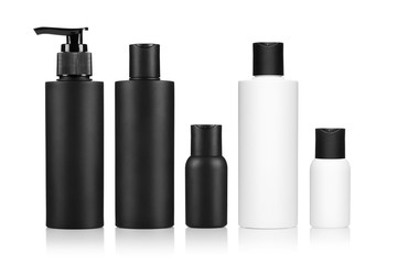 Set of black and white plastic bottles, isolated on white background